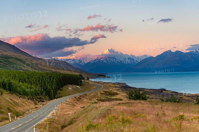 View of Mount Cook with road and lake
