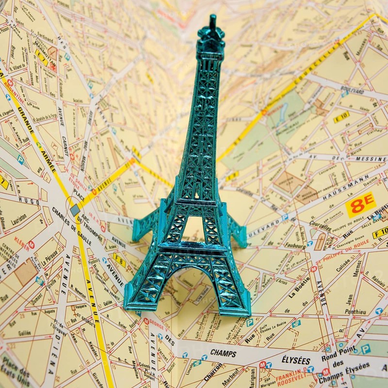 Eiffel Tower on city map of Paris