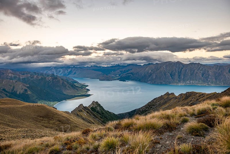 View of Lake Hawea with cloudy sky