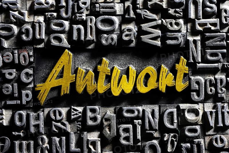 Old lead letters with golden writing