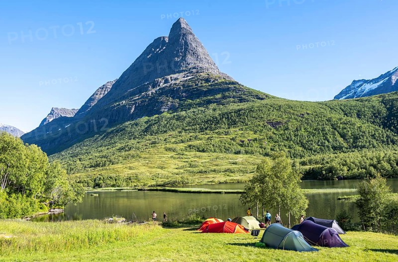 Tents on camping site by the lake Litlvatnet in the high valley Innerdalen