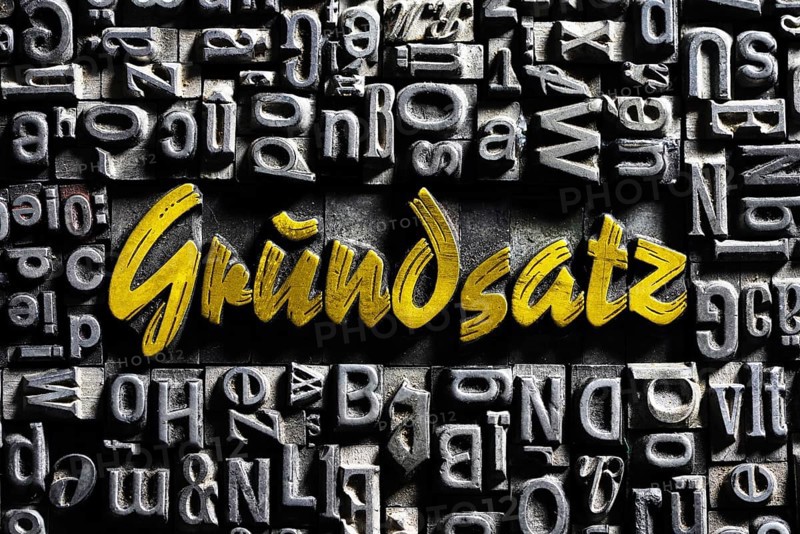 Old lead letters with golden writing