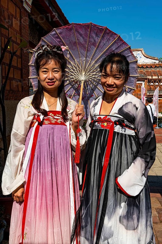 Local dressed women in the traditional Minnan-style houses