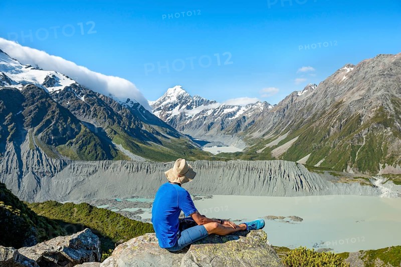 Hiker sitting on a rock