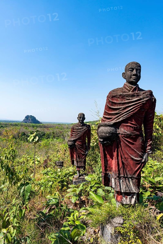 Huge line of monk statues in Win Sein Taw Ya outside Mawlamyine