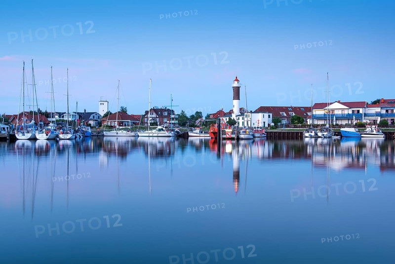 Timmendorf harbour with lighthouse in the evening
