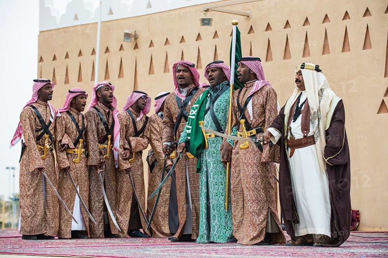 Colourful dressed traditional men