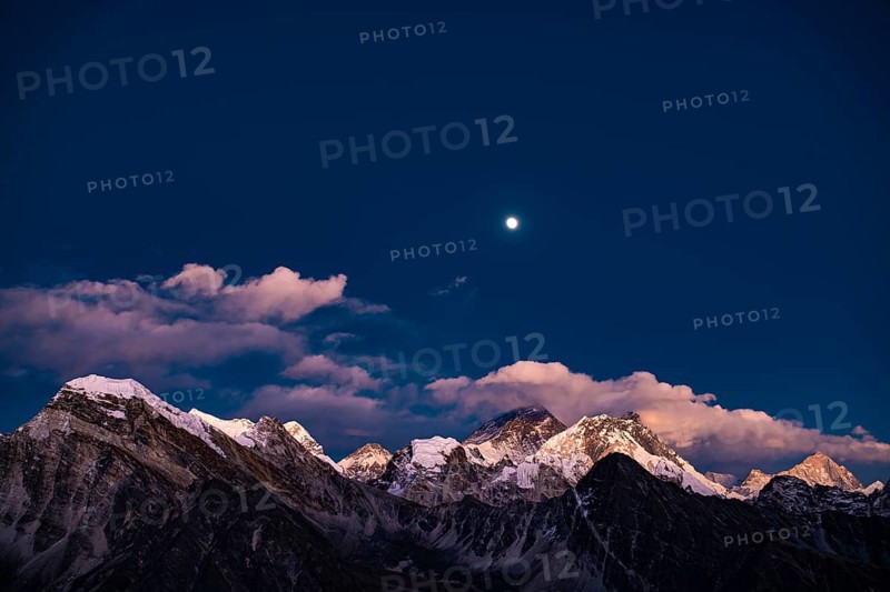 View in the moonlight from Renjo La Pass 5417 m to the east on Himalaya with Mount Everest