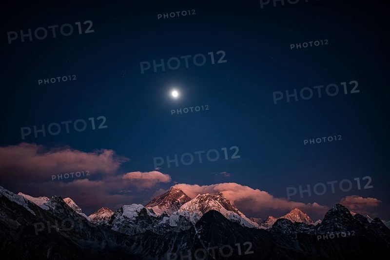 View in the moonlight from Renjo La Pass 5417 m to the east on Himalaya with Mount Everest
