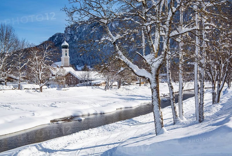 Bank at the river Ammer with parish church
