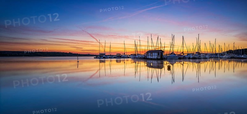 Sailing boats at sunrise