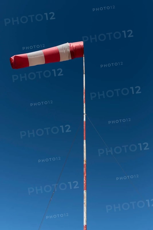 Inflated windsock in blue sky