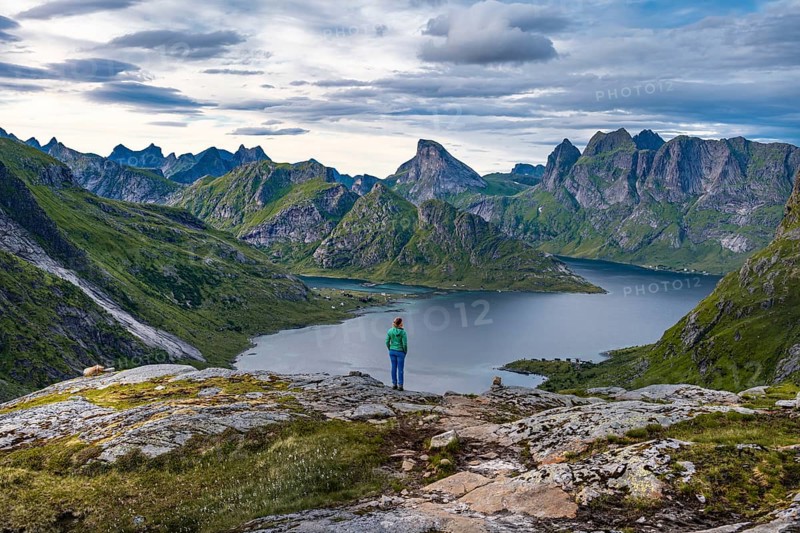 Hiker walks through mountain landscape