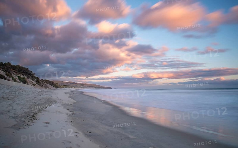 Sandy beach beach at sunset
