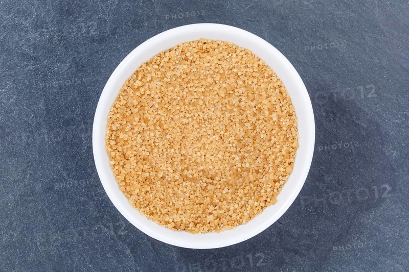 Brown sugar cane sugar from top slate slate board