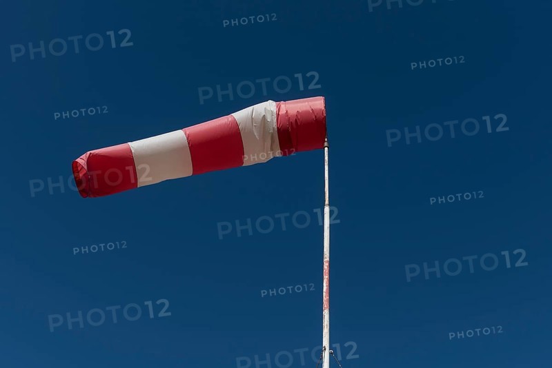 Inflated windsock in blue sky