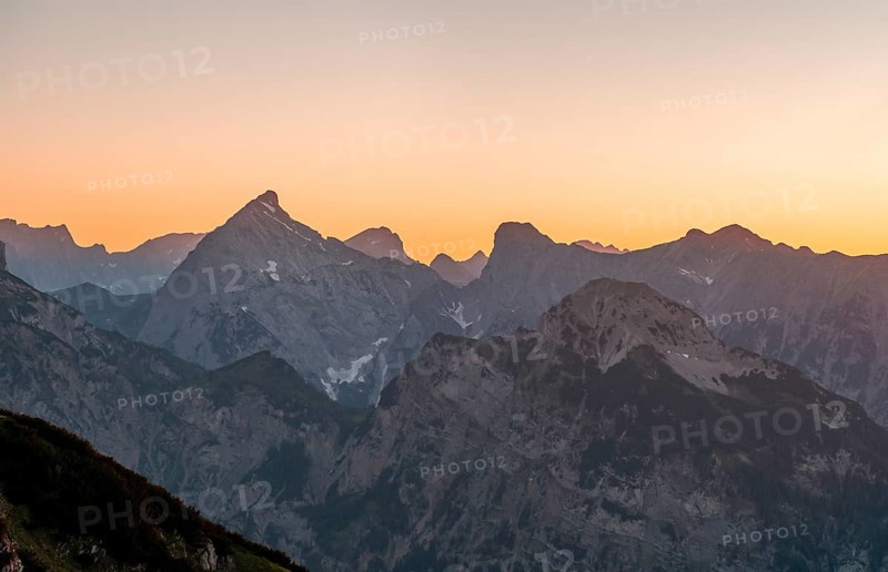 Sunset behind mountain silhouette