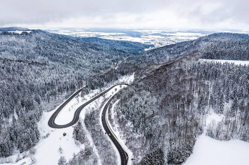 Winter snow road serpentine curves aerial photo near Albstadt curve