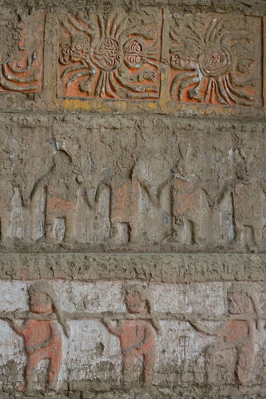 Colourful reliefs of the Moche culture on adobe walls