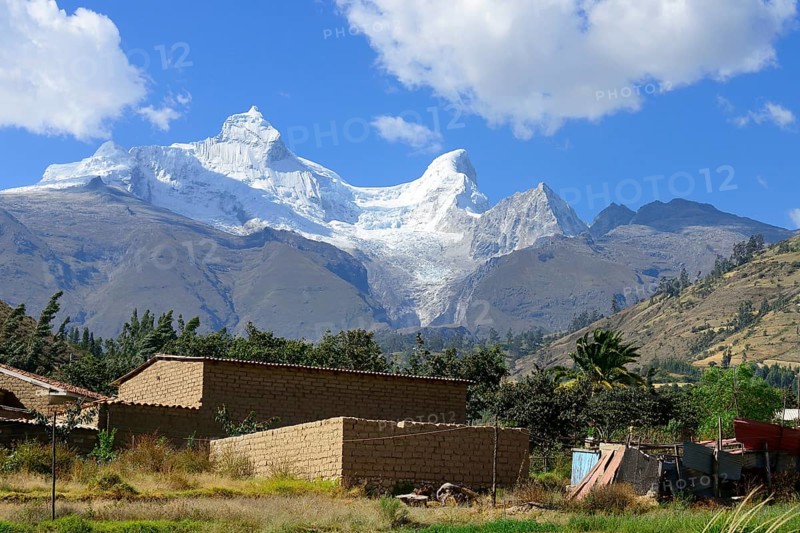 Farm at the foot of the mountain Nevado Huandoy