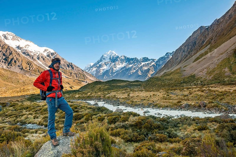 Hiker standing on a rock