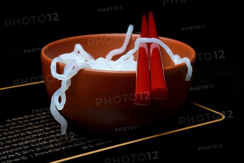 Shirataki noodles made from konjac flour in a bowl with chopsticks
