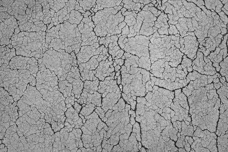 Cracked tar pavement