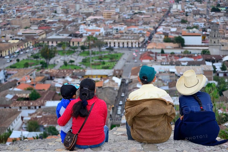 Indigenous family at the Cerro Santa Apolonia viewpoint overlooking the city