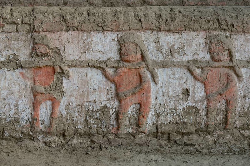 Colourful reliefs of the Moche culture on adobe walls