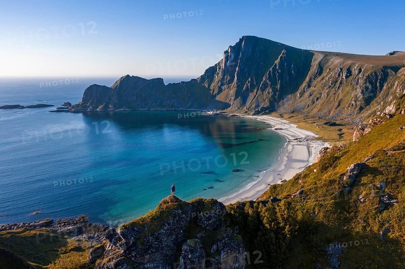 Hiker standing at the precipice