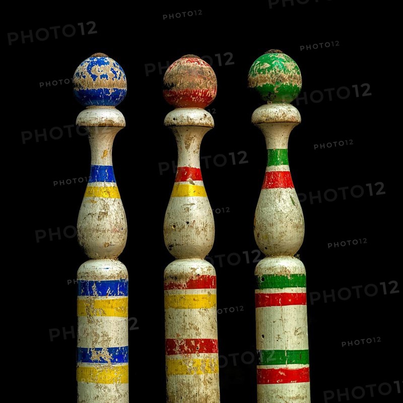 Multicoloured skittles on black background