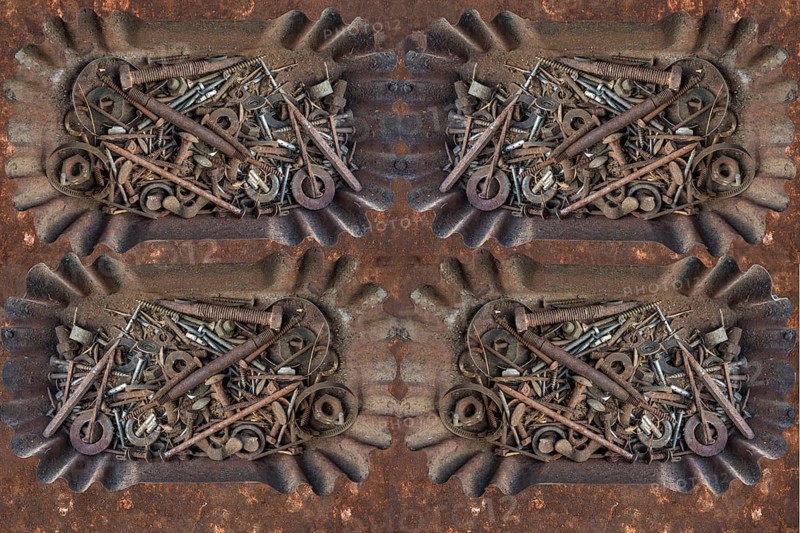 Rusty screws and nails in metal shells
