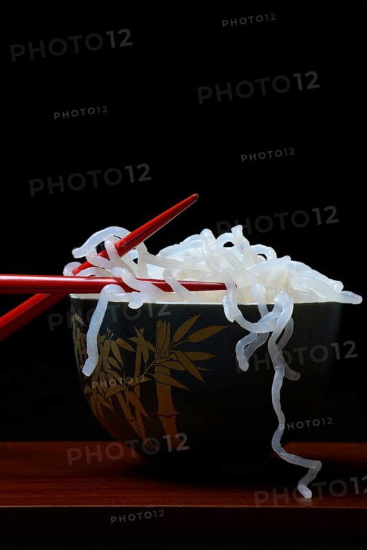 Shirataki noodles made from konjac flour in a bowl with chopsticks