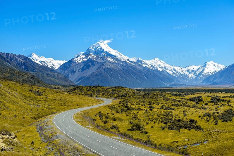 Country road overlooking snow-capped Mount Cook National Park