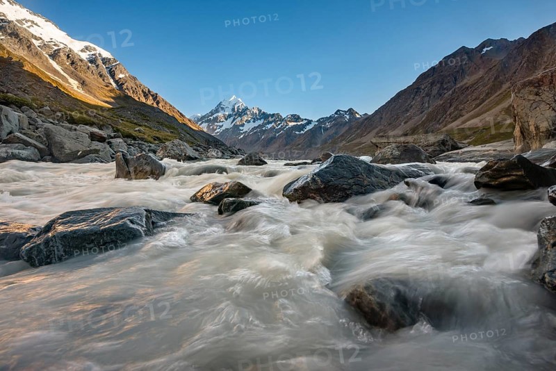 Hooker River in Hooker Valley with view of snow-capped Mount Cook
