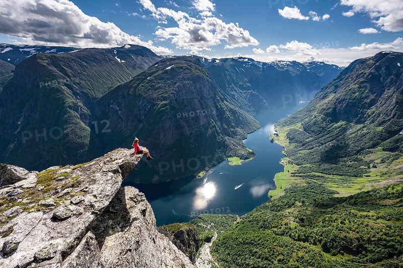 Hiker sitting on rock