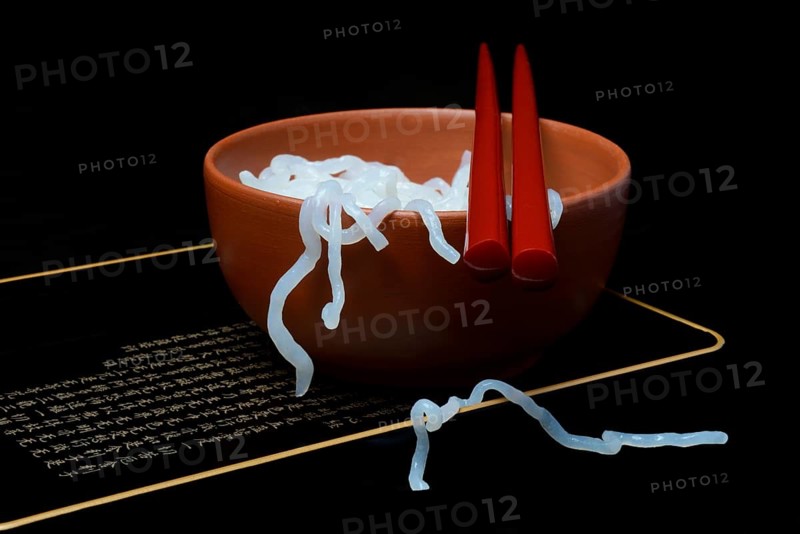 Shirataki noodles made from konjac flour in a bowl with chopsticks
