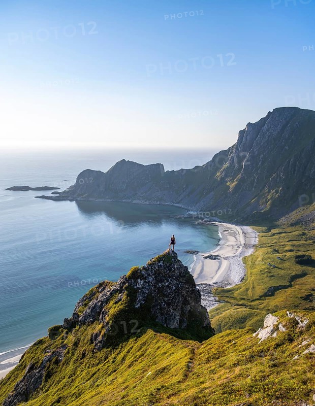 Hiker standing at the precipice