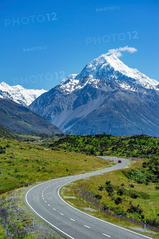 Country road overlooking snow-capped Mount Cook National Park