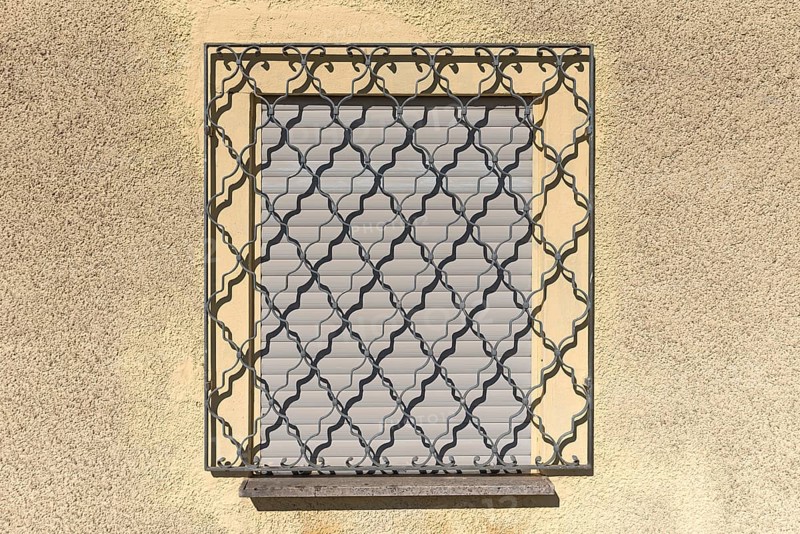 Grille in front of closed window