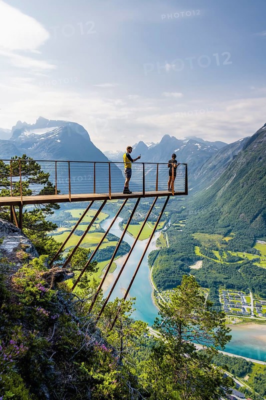 Hikers standing on viewing platform Rampestreken