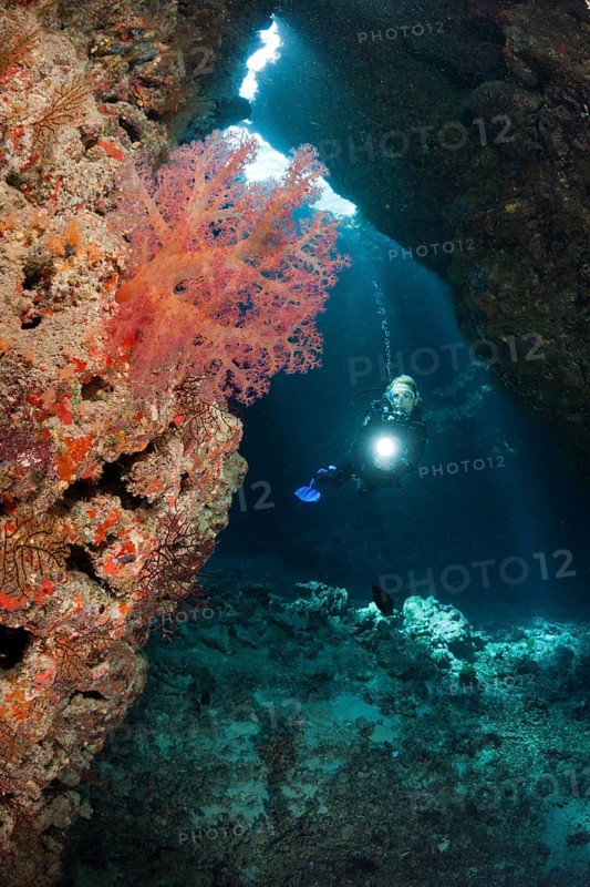 Diver in underwater cave