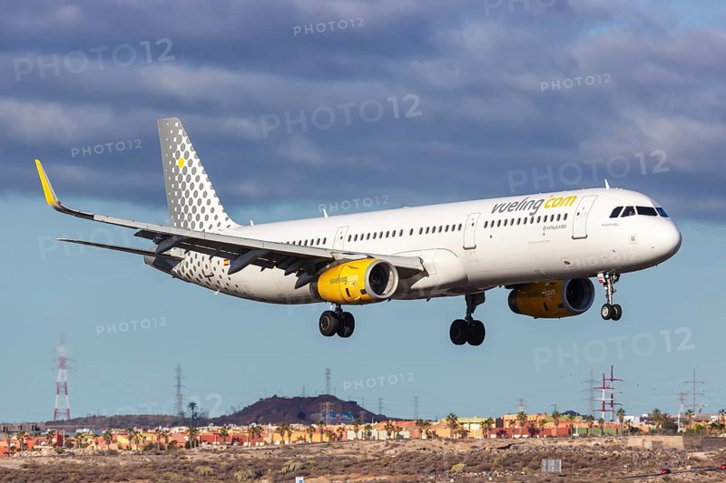 A Vueling Airbus A321 aircraft with registration EC-MMH at Tenerife South Airport