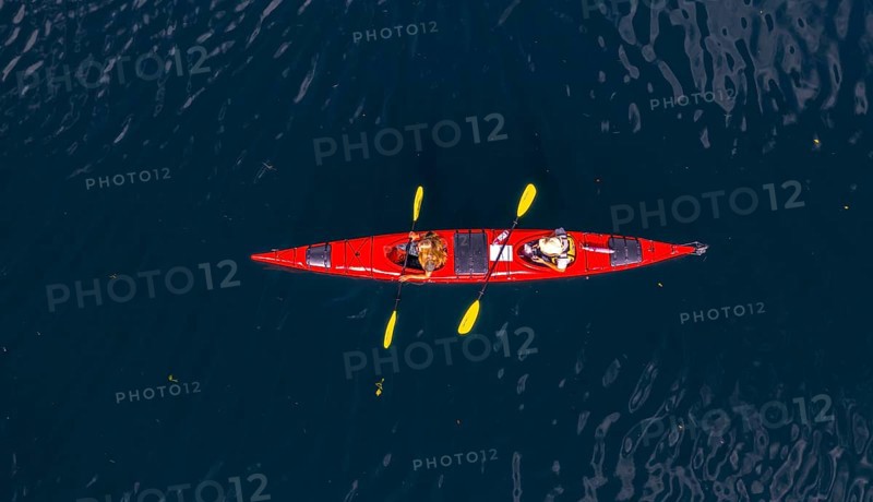 Red kayak in Geirangerfjord from above