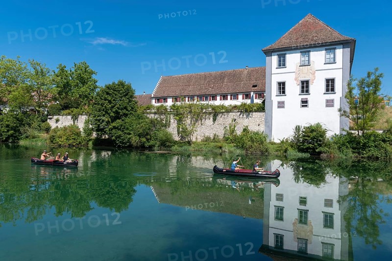 Canoeist on the Rhine near the monastery island Rheinau