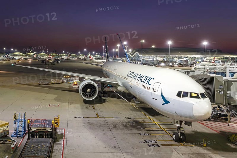 A Cathay Pacific Boeing 777-300ER aircraft with registration number B-KPE at Hong Kong Airport