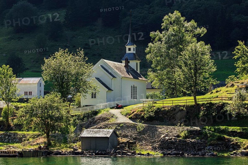 Church in the village Tuftefossen