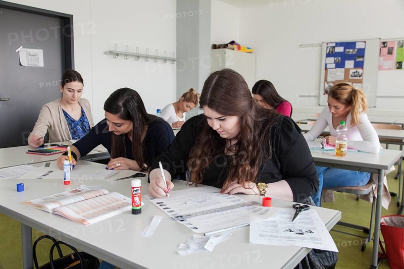 Vocational school students in class of the vocational training to become a beautician. Dual system at the Elly-Heuss-Knapp-Schule