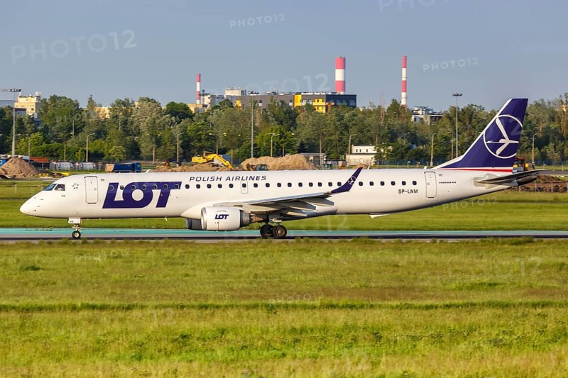 An Embraer 195 of LOT Polskie Linie Lotnicze with registration SP-LNM at Warsaw Airport