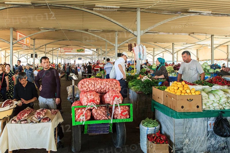Market stand with vegetables and meat